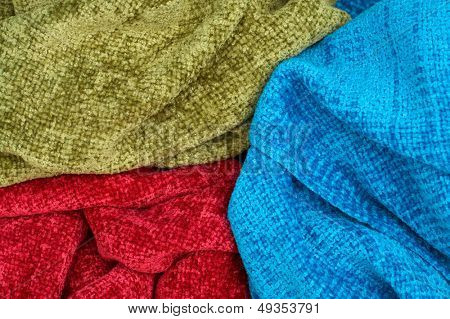 ผ้าพันคอสีสันหญิงเป็นพื้นหลัง