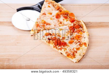 Tomato Pizza Slices With Cutter