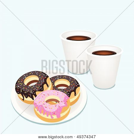 A Hot Coffee In Disposable Cup With Glazed Donuts