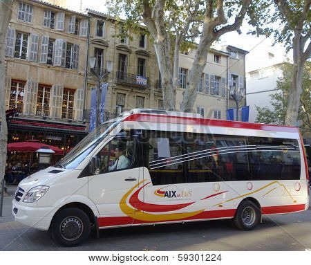 Aix en Bus minibus in medieval part of Aix en Provence, France