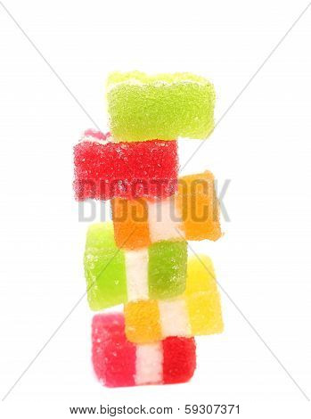 Stack of different fruit-paste candies