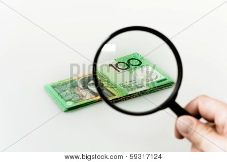 Pile of cash being inspected