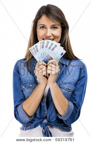 Beauitful woman holding some Euro currency notes, isolated over white background