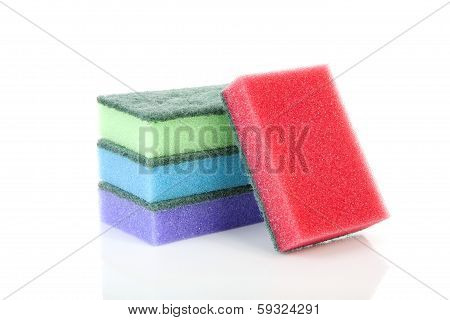 Pile Of Colorful Sponge Scourer Over White Background