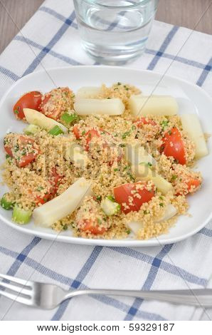 Couscous Salad with tomatoes, peas and asparagus