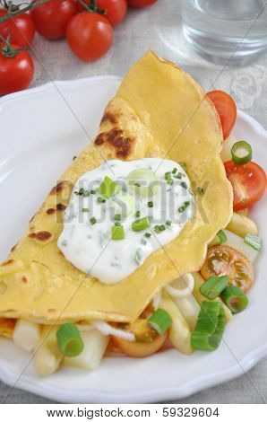 Pancakes filled with Asparagus and fresh vegetables.