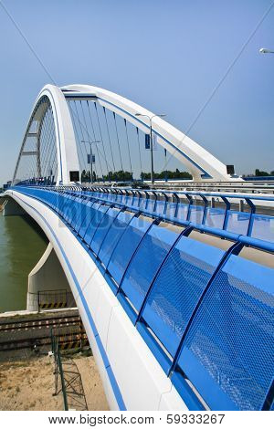 BRATISLAVA-JULY 31: Modern Apollo bridge over Danube (Dunaj) river in Slovakia on July 31, 2007.