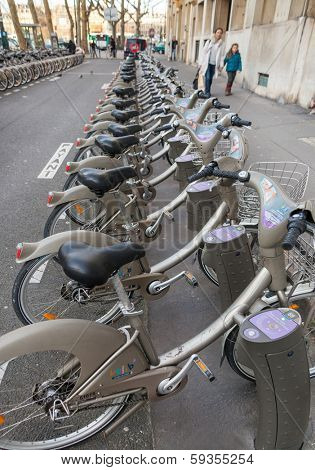 PARIS, FRANCE - JANUARY 6, 2012: Velib bicycles in the row. Velib is a large-scale public bicycle sharing system in Paris, France.