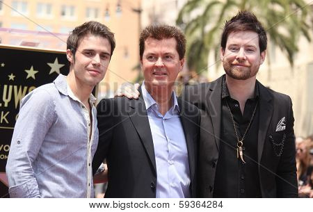 LOS ANGELES - MAY 23:  Kris Allen, Simon Fuller & David Cook arrives to the Walk of Fame Ceremony for Simon Fuller  on May 23, 2011 in Hollywood, CA                