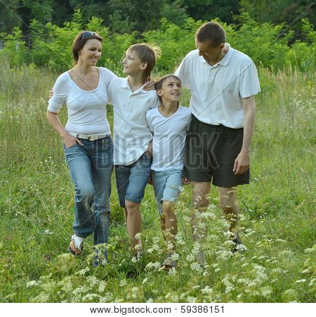 Family walking in park