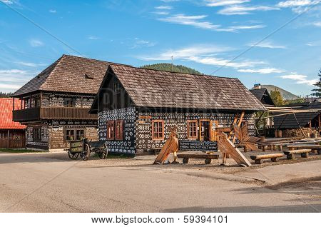 Painted Wooden Houses In Village Cicmany