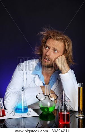 Crazy scientist working in laboratory