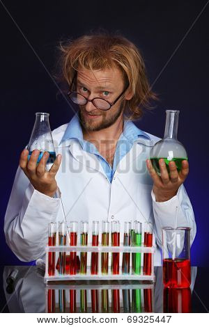 Crazy scientist working in laboratory