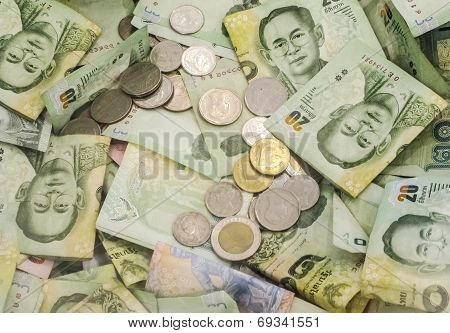 Thai Baht Note And Coin Money Display As Background