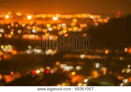 Blur image, love or heart shape bokeh of light