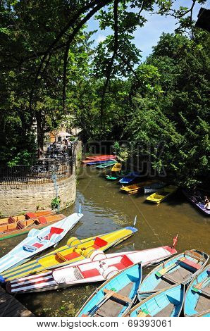 Punts and pedalos on river, Oxford.