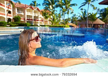 Woman relaxing in . Vacation at caribbean resort.
