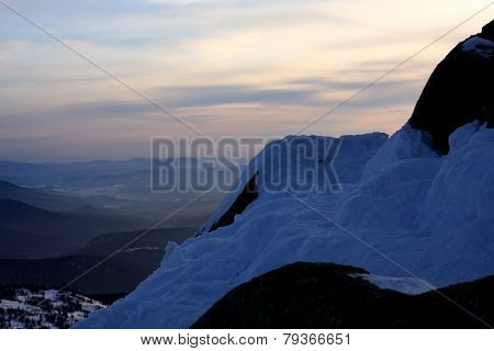 Sunset is in mountains.