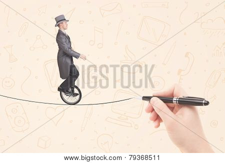 Businessman riding monocycle on a rope drawn by hand concept