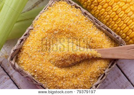 Corn Meal On Wooden Background