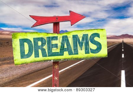 Dreams sign with road background
