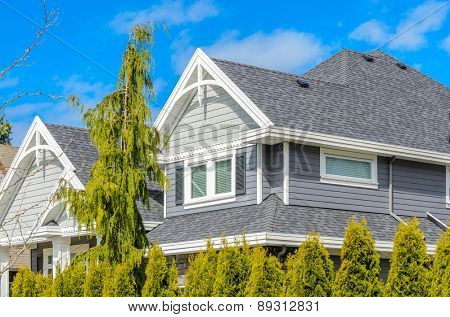 The roof of the house with nice window.