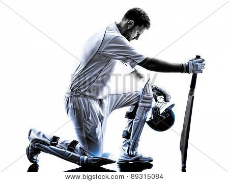 Cricket player batsman in silhouette shadow on white background