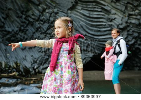 Family Enjoying Adventure In Golle Del Alcantara Gorge