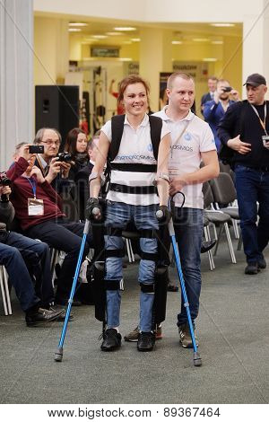 MOSCOW, RUSSIA - APRIL 22, 2015: Demonstration of an ekzoskeleton at an exhibition of the rehabilitation equipment for disabled people 