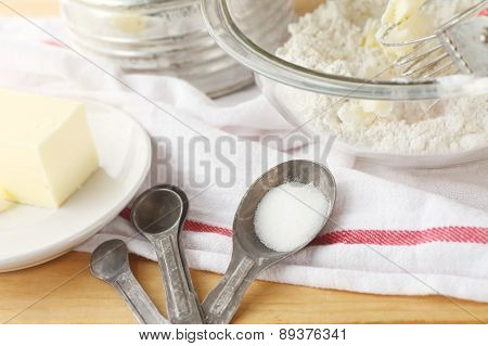 Baking still life with old measuring spoons