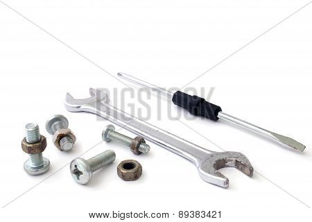 S Screwdriver Wrench Bolts And Screws On A White Background