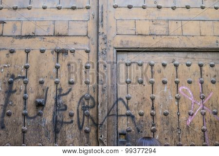 old wooden door Castilian style in Toledo Spain