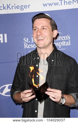 MOORPARK, CA - OCT 5: Magician Lee Terbosic arrives at the 8th Annual Medlock/Krieger Invitational Golf Concert at the Moorpark Country Club in Moorpark, CA on October 5, 2015.