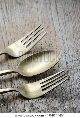 Old Brass Spoon And Fork