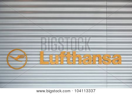 Lufthansa logo on wall at Frankfurt airport