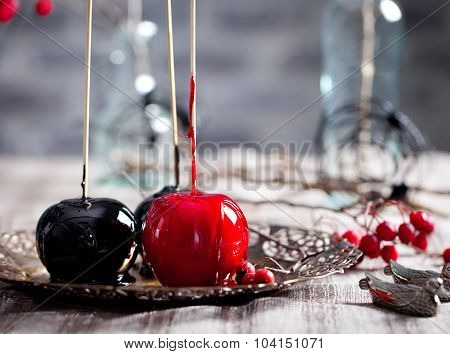 Halloween black and red caramelized apples