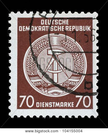 GDR - CIRCA 1952: A Stamp printed in GDR (German Democratic Republic - East Germany) shows DDR national coat of arms with inscription Service Stamp, series GDRs national coat of arms, circa 1952
