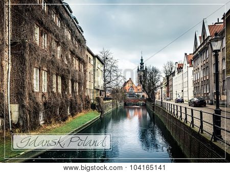postcard with canal and old historic buildings in the old town of Gdansk, Poland