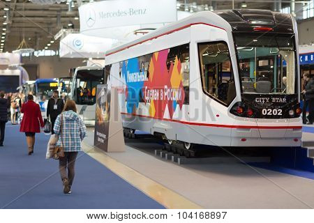 MOSCOW, RUSSIA - CIRCA NOVEMBER, 2014: People visit ExpoCityTrans exhibition. ExpoCityTrans is a unique event in the sphere of public transport consisting of an exhibition and business events.