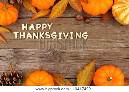 Happy Thanksgiving wooden letters with autumn double border on wood