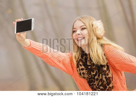 Happy Fashion Woman In Park Taking Selfie Photo.