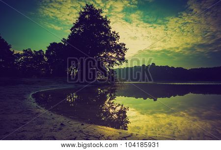 Vintage Photo Of Beautiful Sunset Over Calm Lake