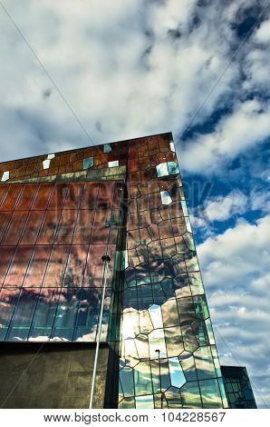 Harpa concert hall in Reykjavik harbor at sunrise, Iceland
