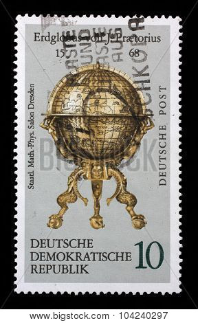 GDR-CIRCA 1972: A stamp printed in the DDR (East Germany) shows vintage globe, one stamp from series devoted State saloon of physics in Dresden, circa 1972