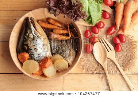 Salmon Head Cooked Of Tari Yaki Sauce With Fresh Vegetables.