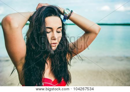 Long Hair Girl Relaxing On The Beach