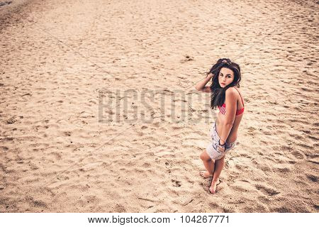 Long Hair Girl Relaxing On The Beach