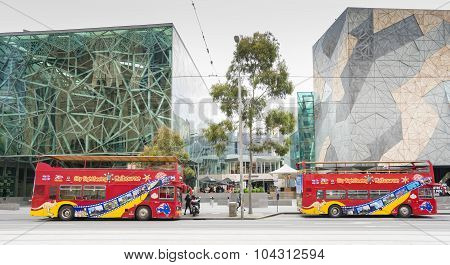 Two Sightseeing Open Top Buses In Melbourne