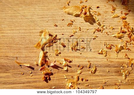 Croissant Crumbles On The Wooden Plate