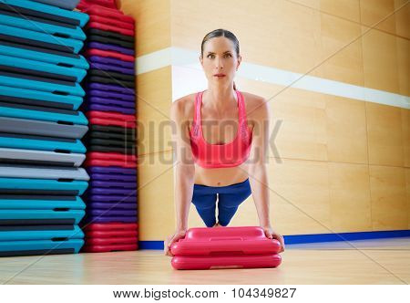 Push up push-ups woman exercise workout at gym indoor